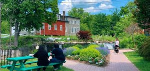 couple sitting on bench in park